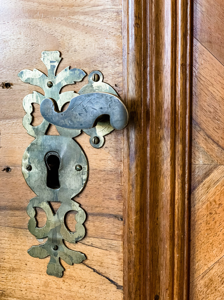 design inspiration metal door handle detail curling shape medieval